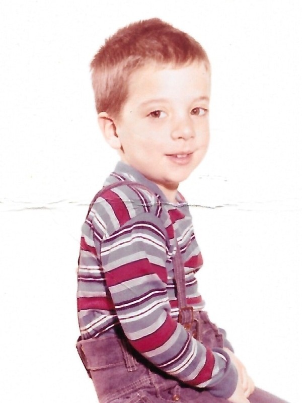 David in a solo photo at 3 years old